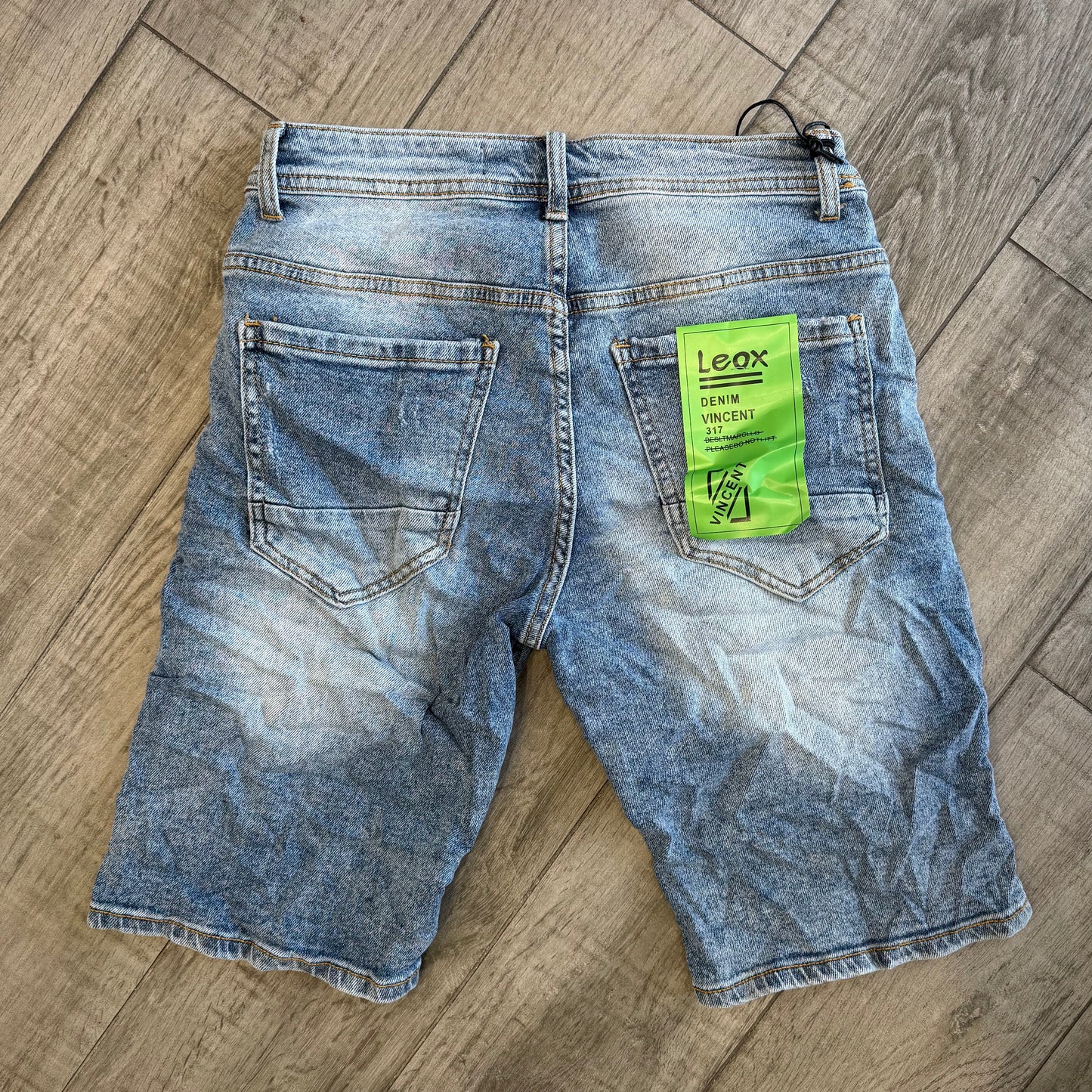 Bermuda Jeans strappi e toppe interne