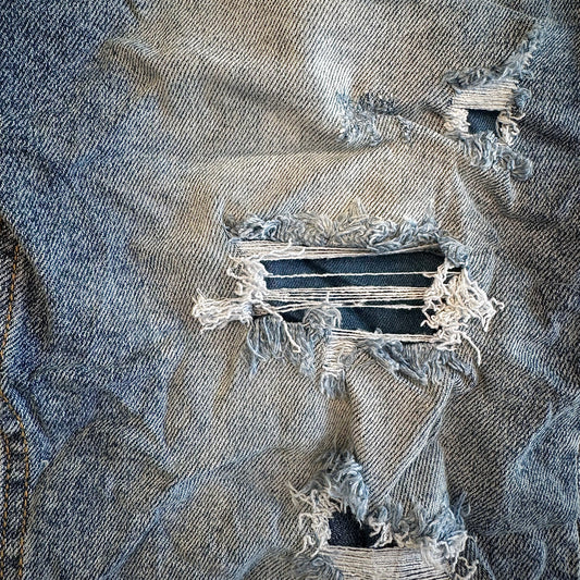 Bermuda Jeans strappi e toppe interne