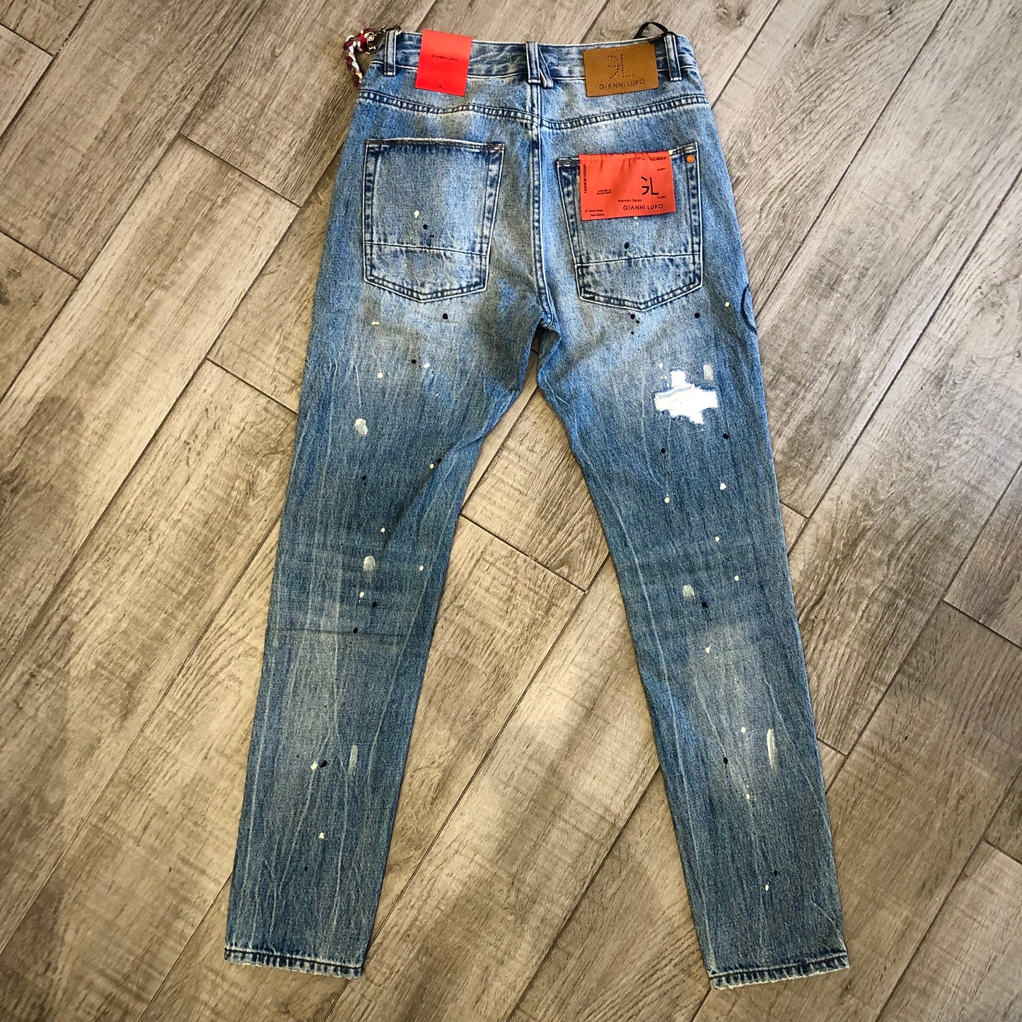 Jeans "Bruce" Regular Fit strappi, toppe interne e spruzzi di vernice GIANNI LUPO (GL168F)